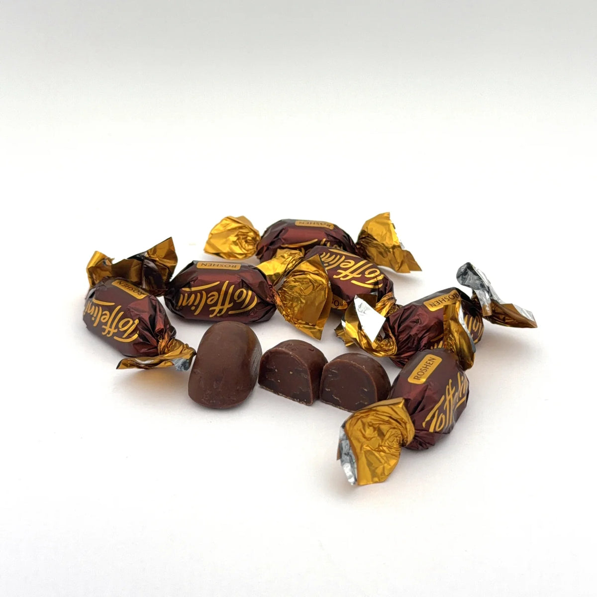 Cukierki Roshen Toffelini w złotych papierkach z kakaowym nadzieniem