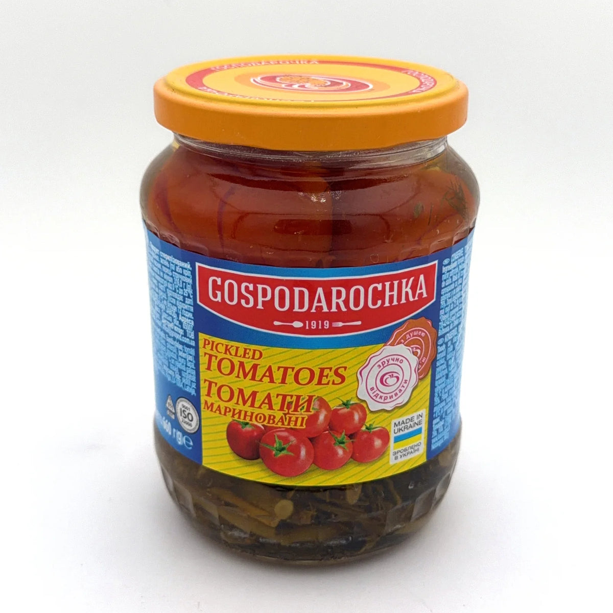 Банка маринованих томатів Gospodarochka 660г з помаранчевою кришкою