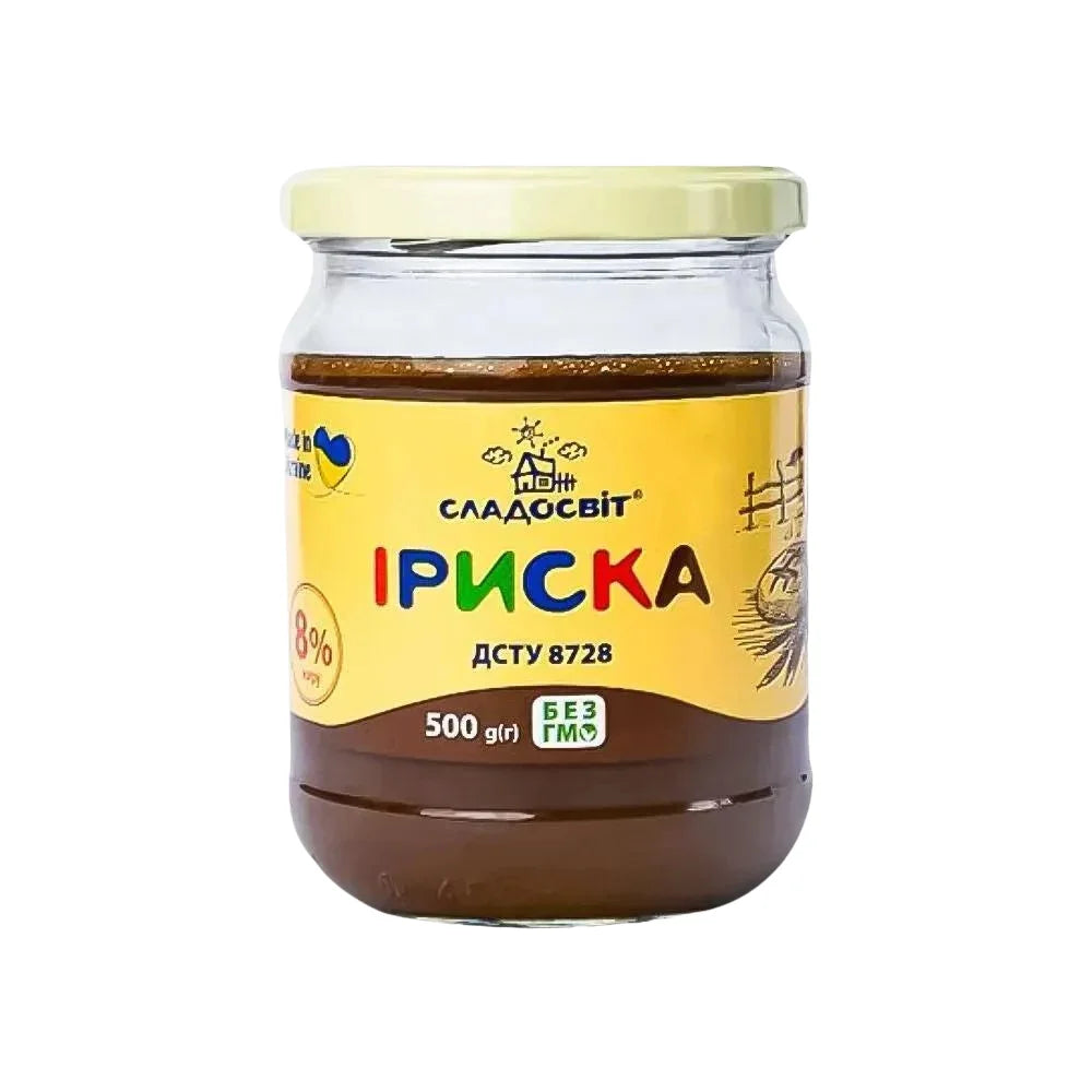 Молочний крем Іриска Sladoswit 8% 500 г у скляній банці зі світло-жовтою кришкою та жовтою етикеткою Головне фото продукту