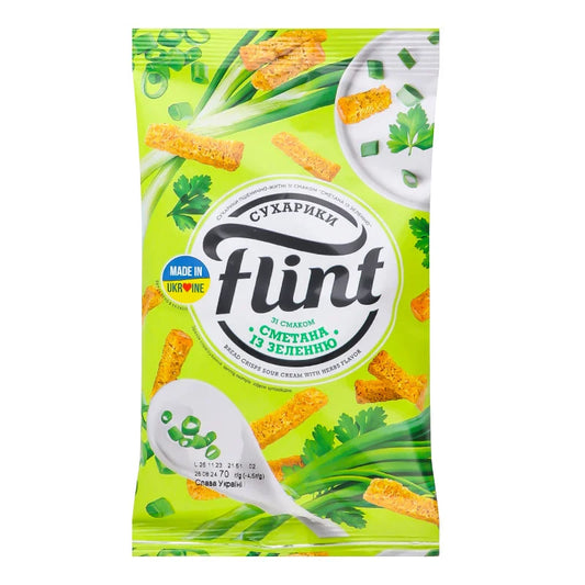 Сухарики Flint 70 г зі смаком сметани із зеленню, у яскраво-зеленому пакеті з грінками й цибулею