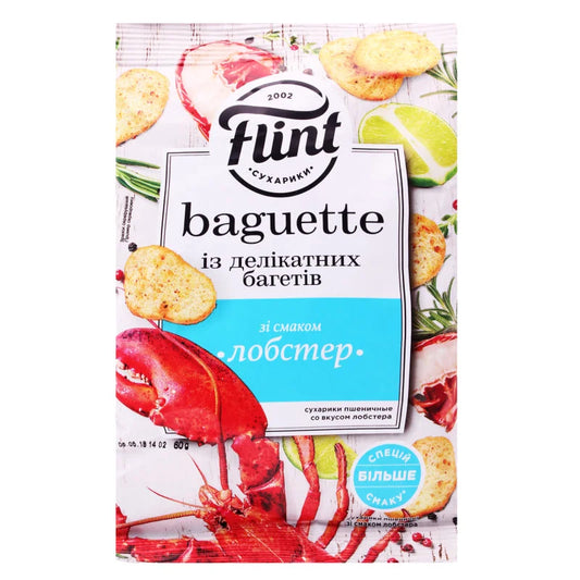 Пшеничні сухарики Flint baguette зі смаком лобстера 60 г у білому пакеті з бірюзовим полем, лобстером, лаймом і грінками